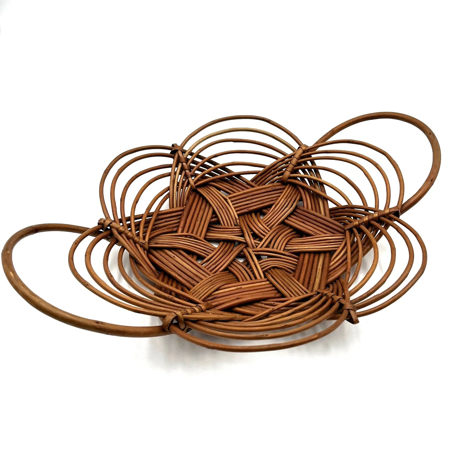 This is a vintage bread or fruit basket with a Celtic knot weave pattern. 
It is a decorative wicker or willow basket often used for serving bread or fruit.
