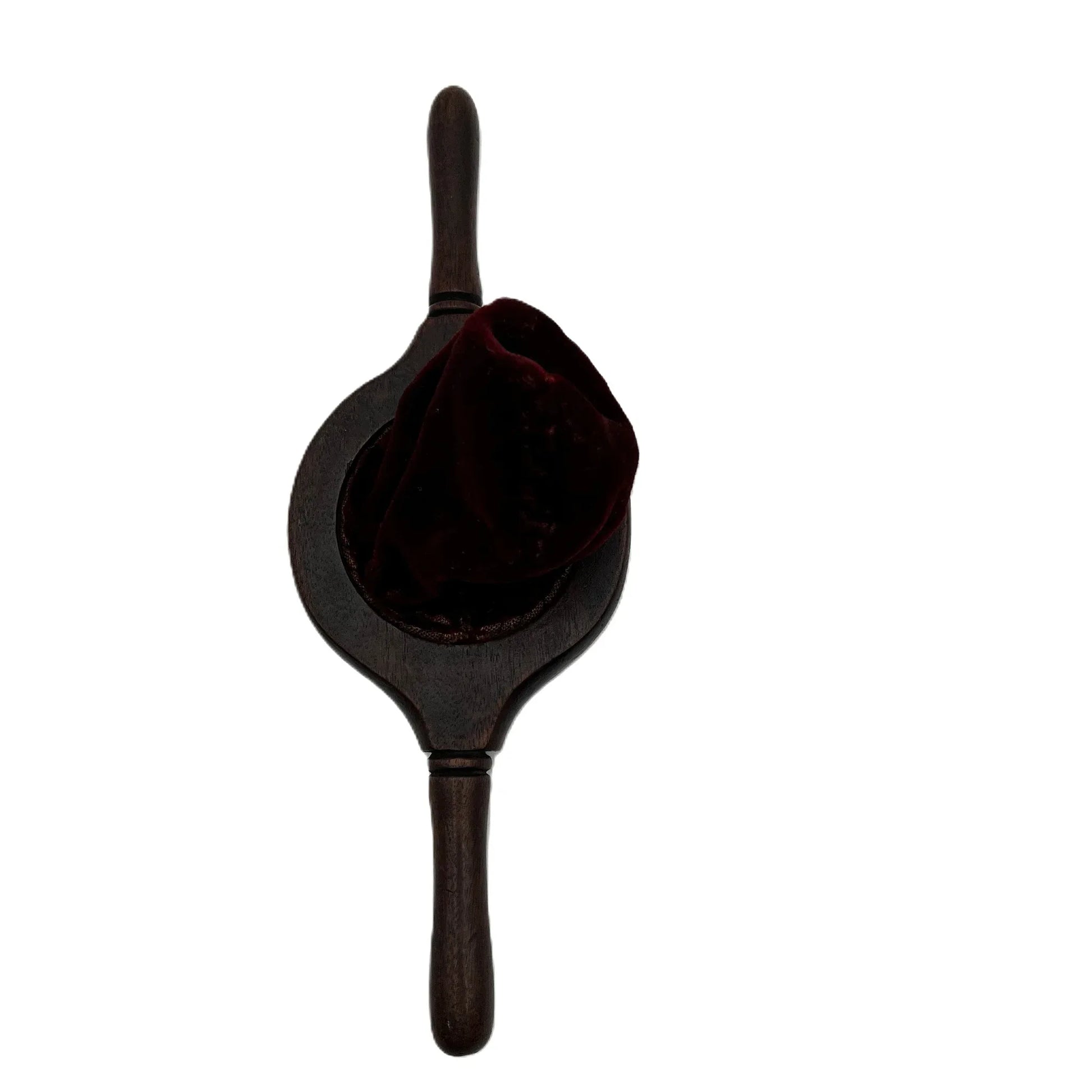 This is an antique wooden-handled church offering or collection velvet bag. These historical items were used in churches to collect tithes and donations from the congregation. 