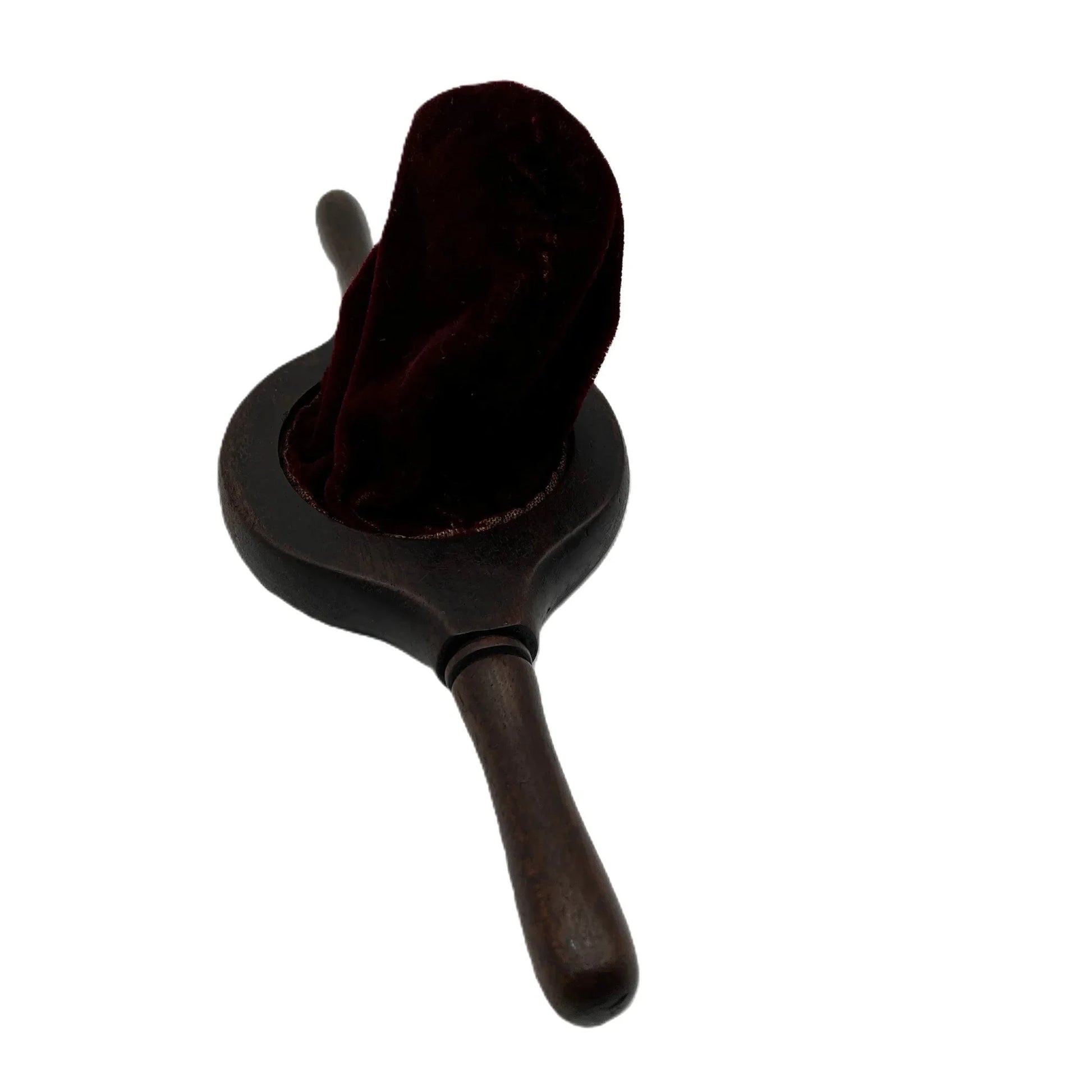 This is an antique wooden-handled church offering or collection velvet bag. These historical items were used in churches to collect tithes and donations from the congregation. 