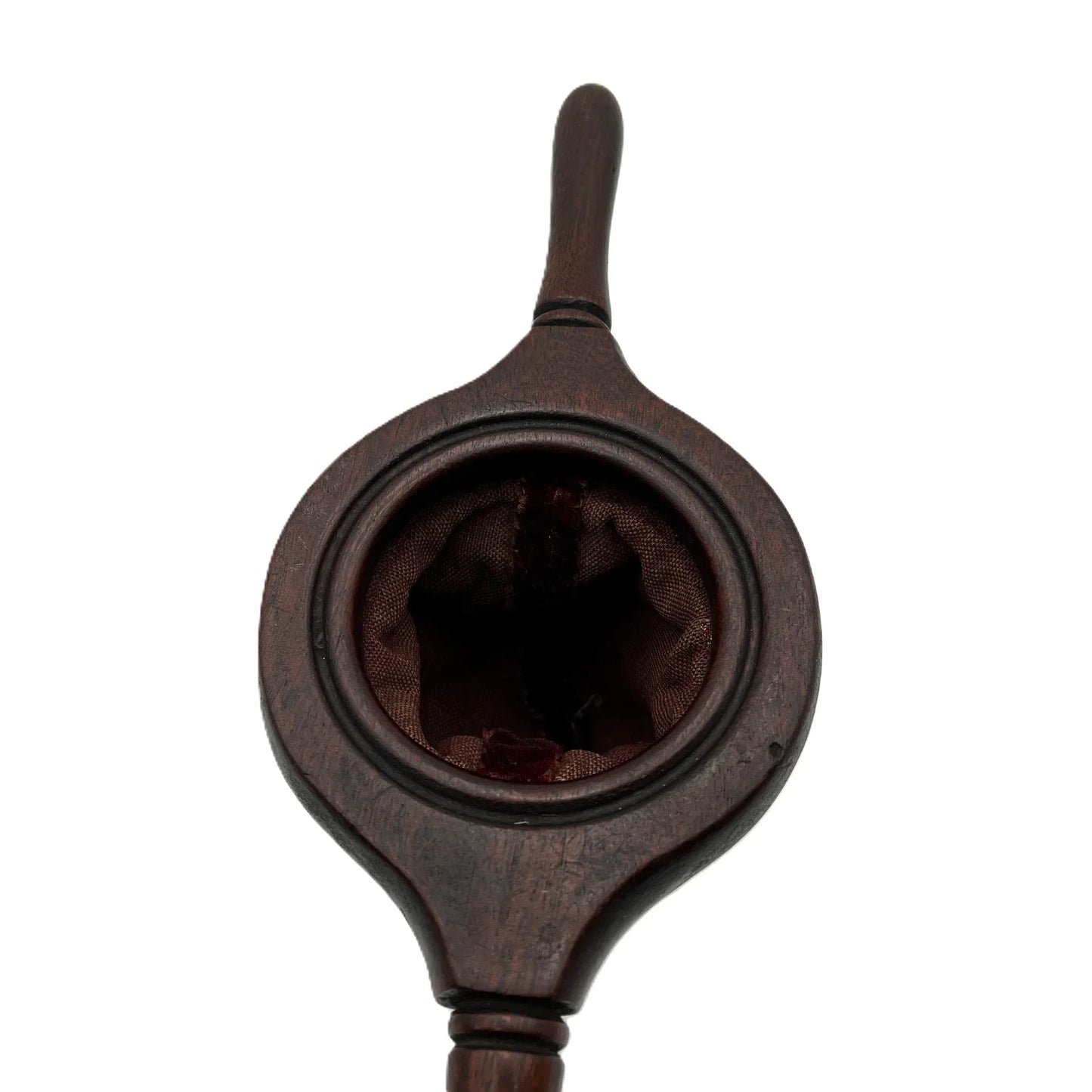 This is an antique wooden-handled church offering or collection velvet bag. These historical items were used in churches to collect tithes and donations from the congregation. 