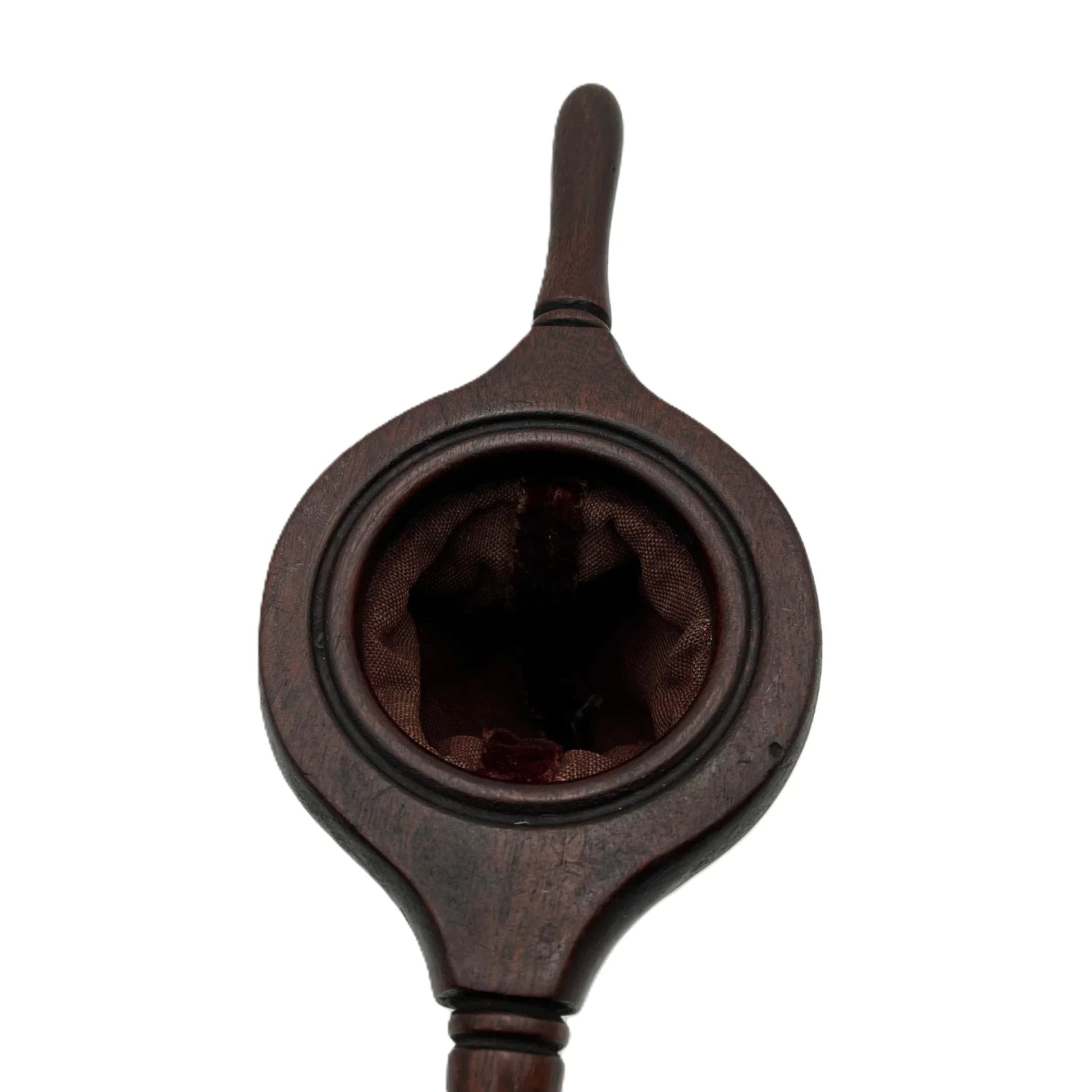 This is an antique wooden-handled church offering or collection velvet bag. These historical items were used in churches to collect tithes and donations from the congregation. 