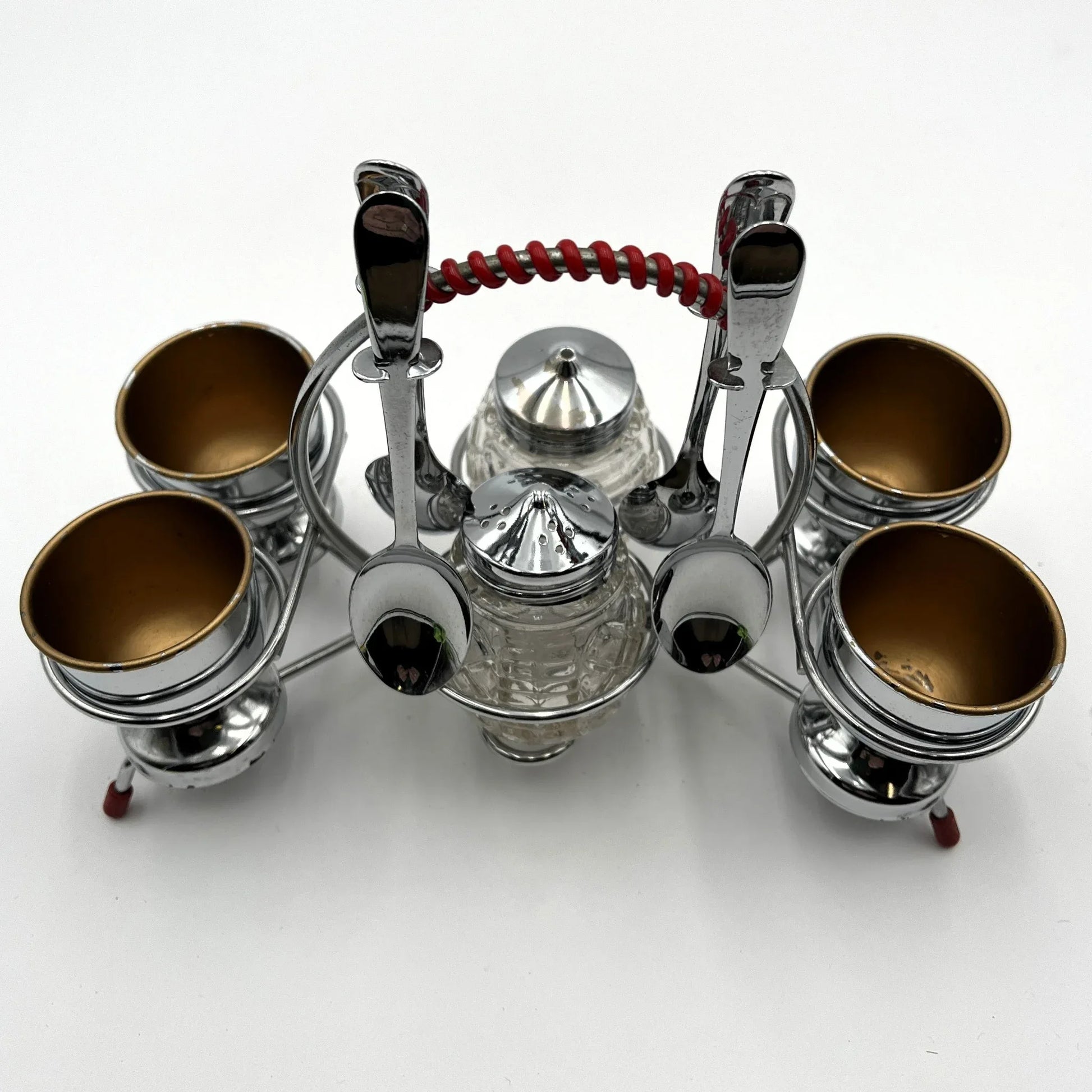 vintage 1960s egg cup holder with 4 egg cups, Salt and Pepper pots and 4 spoons. 