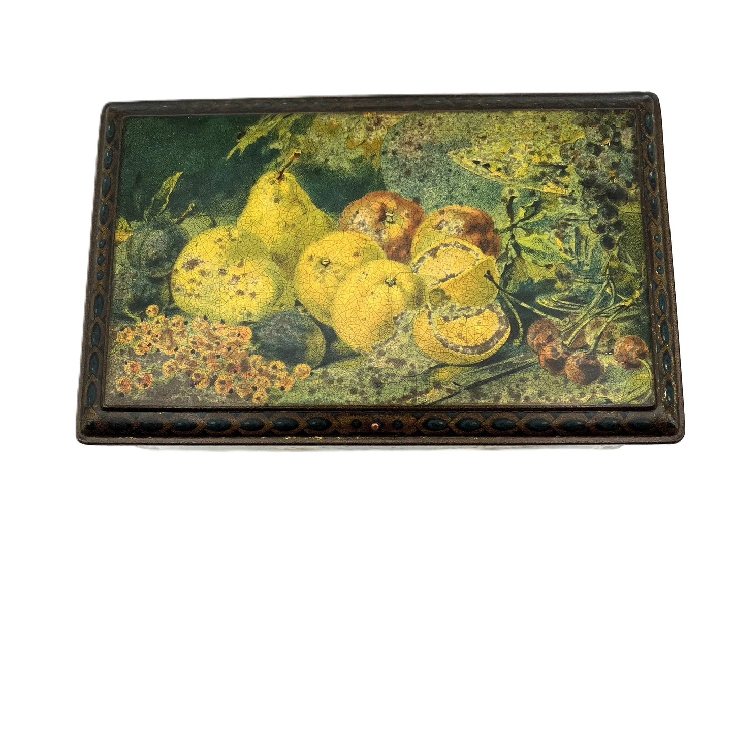 This antique fruit litho art hinged and footed Swiss sweet tin is a rare find for collectors of vintage tins and memorabilia. 