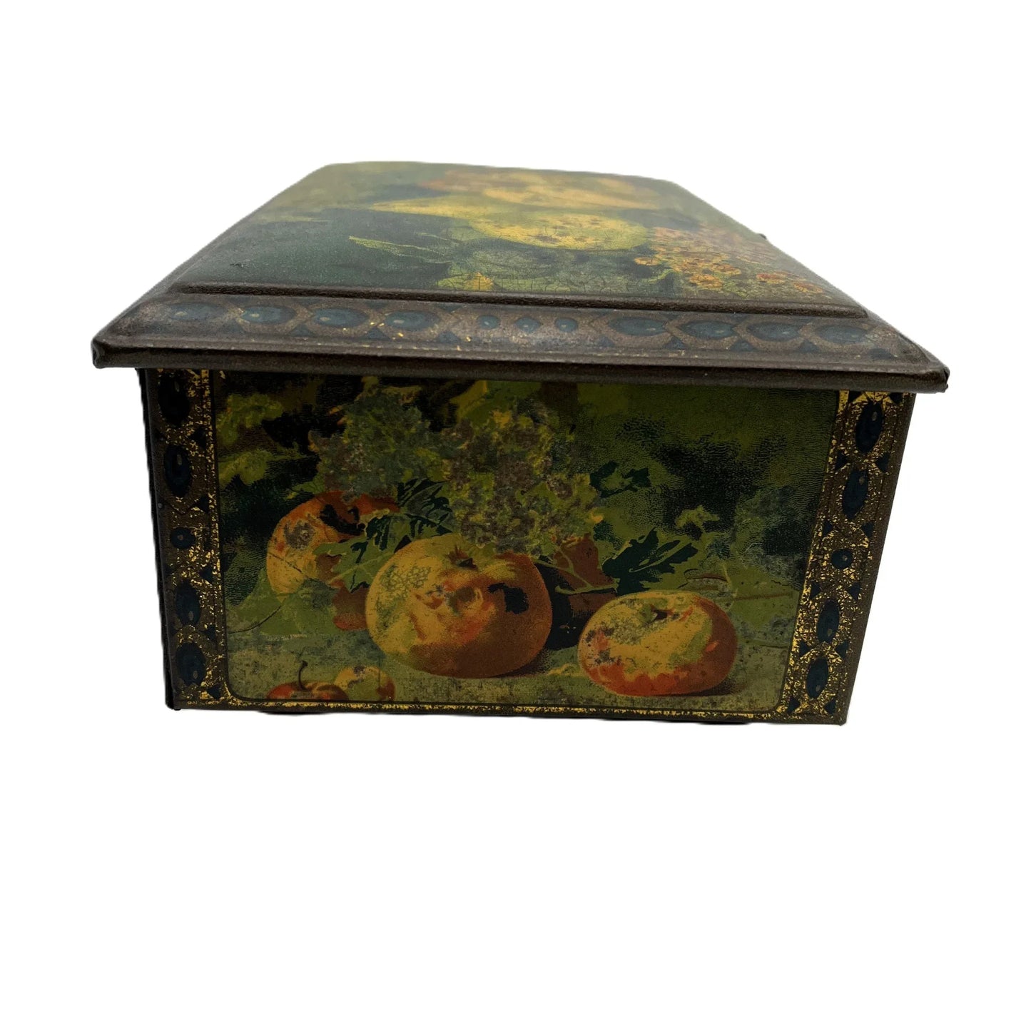 This antique fruit litho art hinged and footed Swiss sweet tin is a rare find for collectors of vintage tins and memorabilia. 