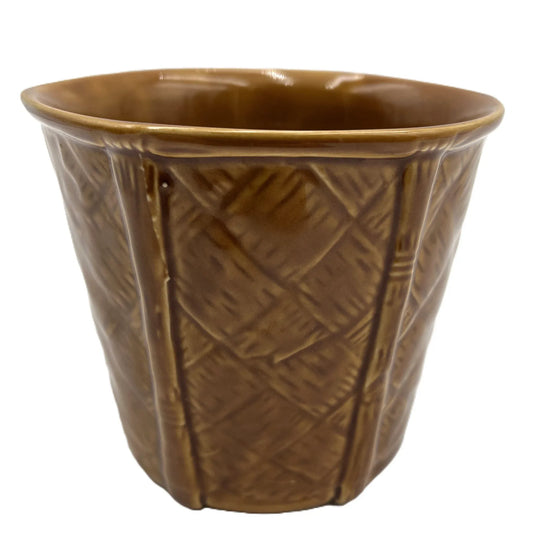 This is a vintage rich mustard rounded hexagonal shaped ceramic planter made by Churchill England. Typically featuring a bamboo and basket-weave or woven texture design, these planters were manufactured in the mid-20th century, often cited as the 1950s to 1980s