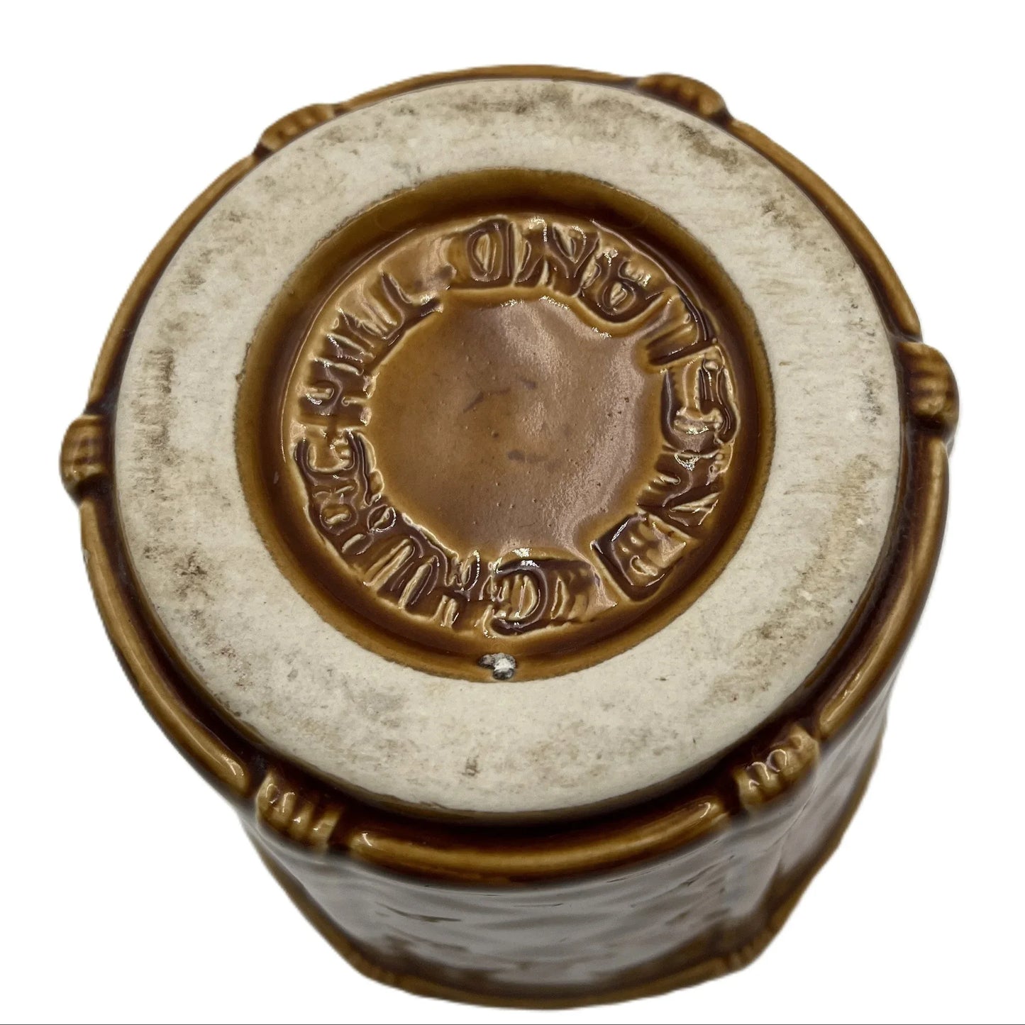 This is a vintage rich mustard rounded hexagonal shaped ceramic planter made by Churchill England. Typically featuring a bamboo and basket-weave or woven texture design, these planters were manufactured in the mid-20th century, often cited as the 1950s to 1980s