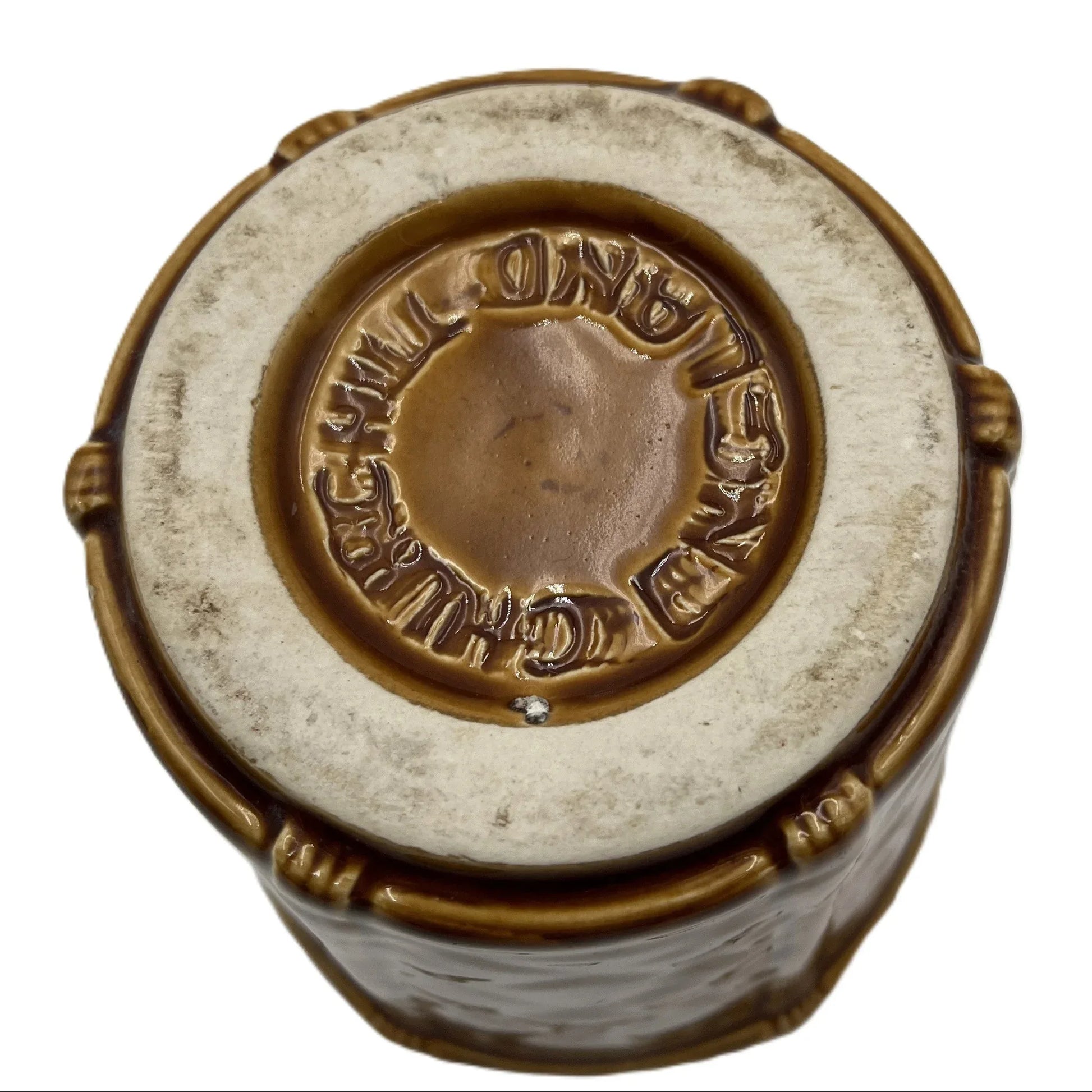 This is a vintage rich mustard rounded hexagonal shaped ceramic planter made by Churchill England. Typically featuring a bamboo and basket-weave or woven texture design, these planters were manufactured in the mid-20th century, often cited as the 1950s to 1980s