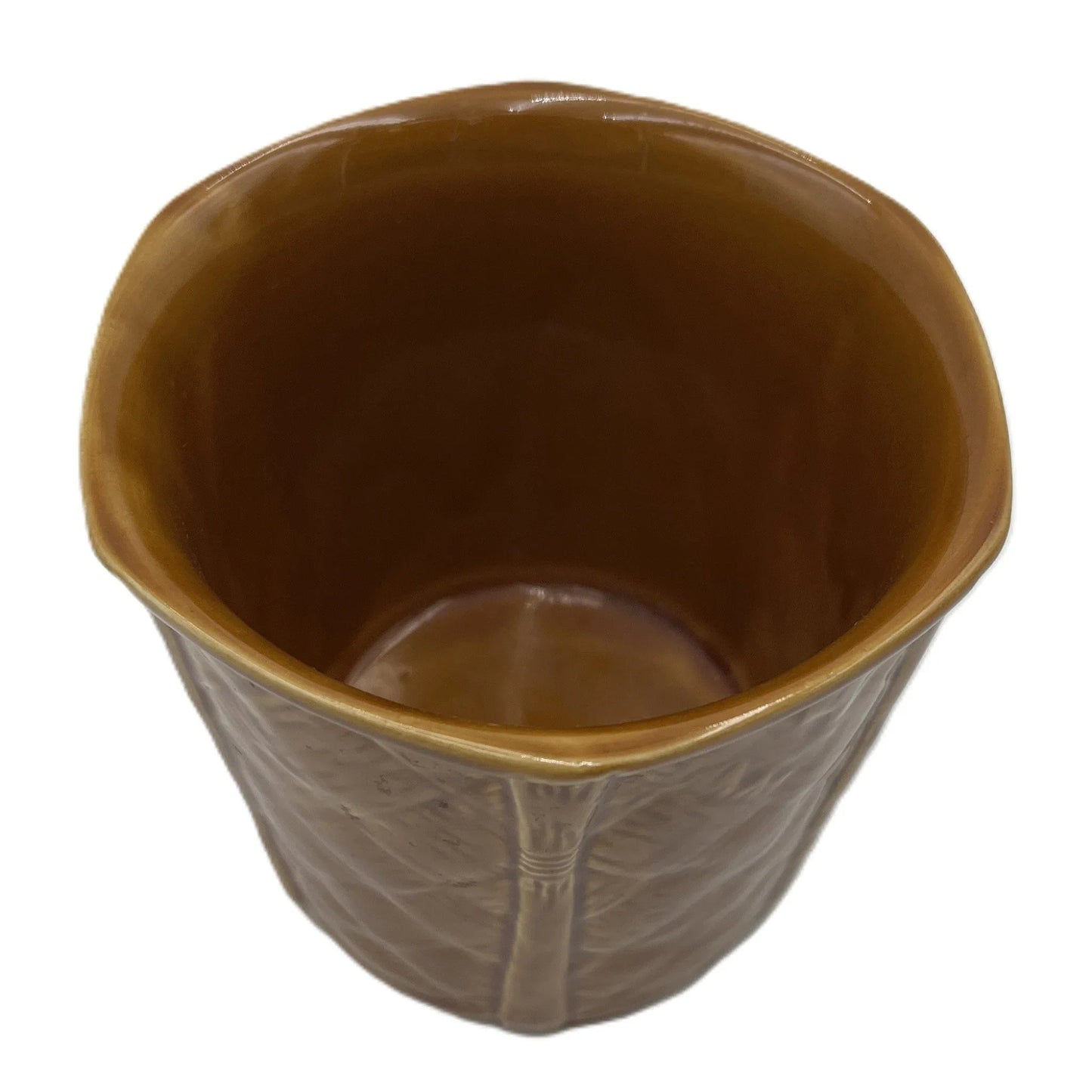 This is a vintage rich mustard rounded hexagonal shaped ceramic planter made by Churchill England. Typically featuring a bamboo and basket-weave or woven texture design, these planters were manufactured in the mid-20th century, often cited as the 1950s to 1980s