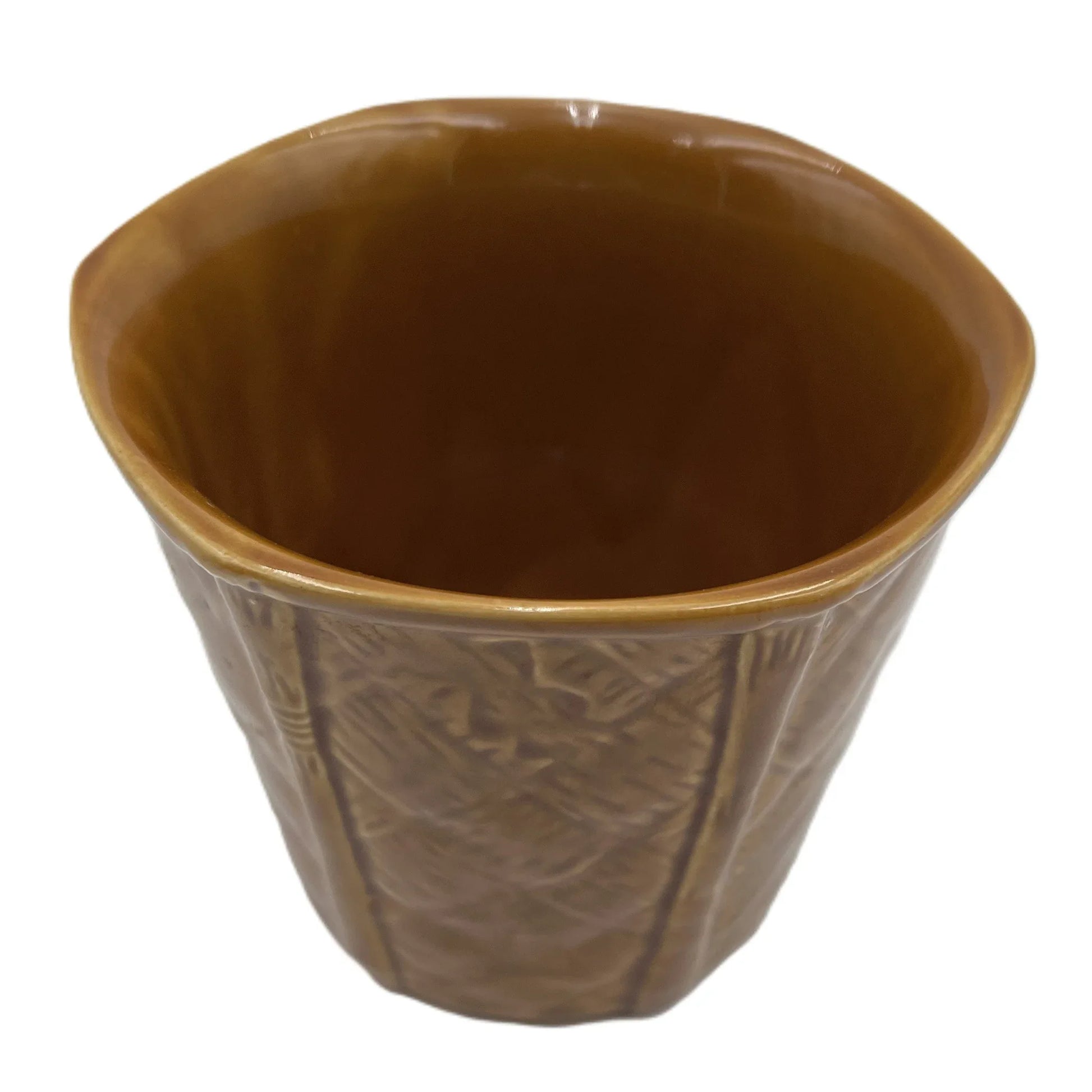 This is a vintage rich mustard rounded hexagonal shaped ceramic planter made by Churchill England. Typically featuring a bamboo and basket-weave or woven texture design, these planters were manufactured in the mid-20th century, often cited as the 1950s to 1980s