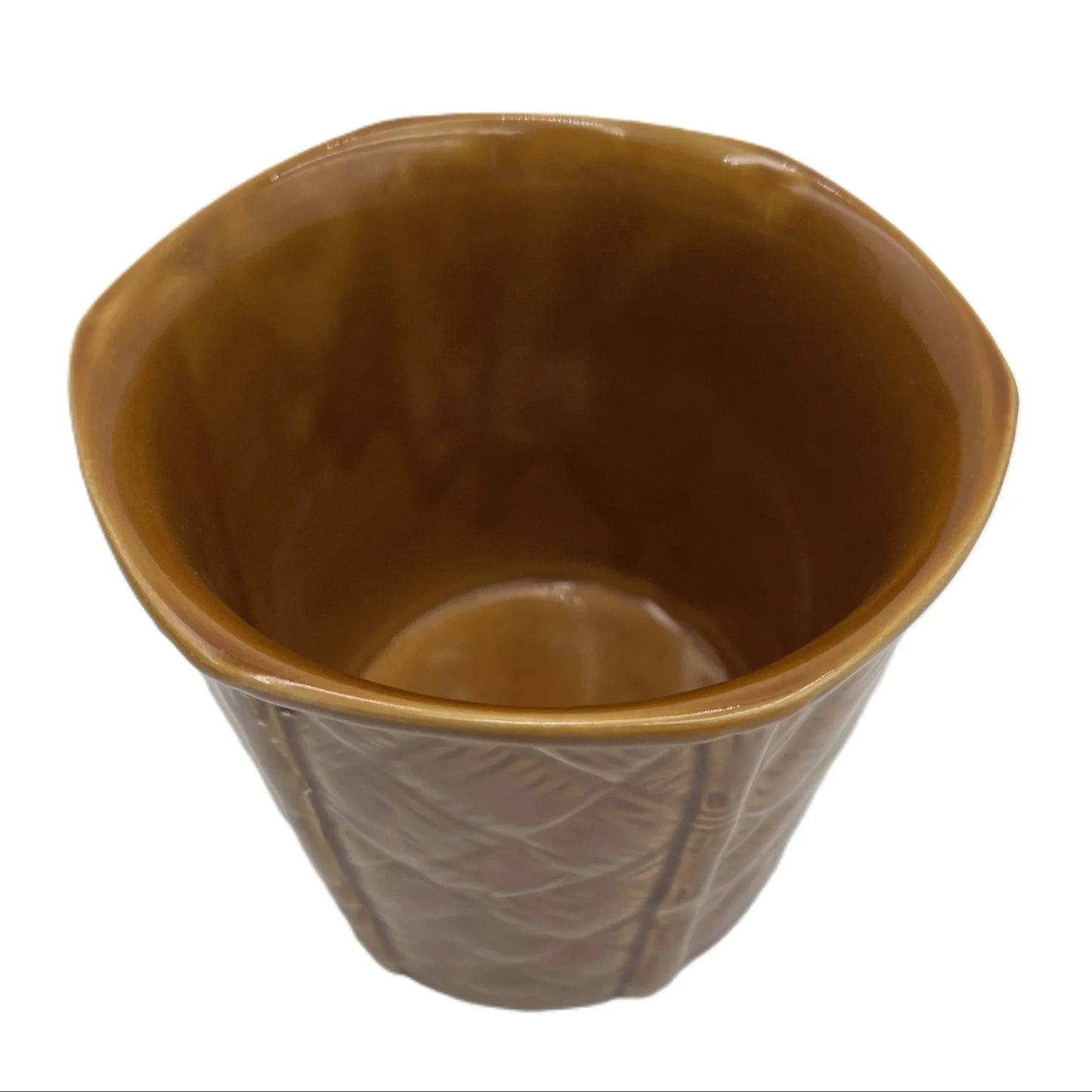 This is a vintage rich mustard rounded hexagonal shaped ceramic planter made by Churchill England. Typically featuring a bamboo and basket-weave or woven texture design, these planters were manufactured in the mid-20th century, often cited as the 1950s to 1980s