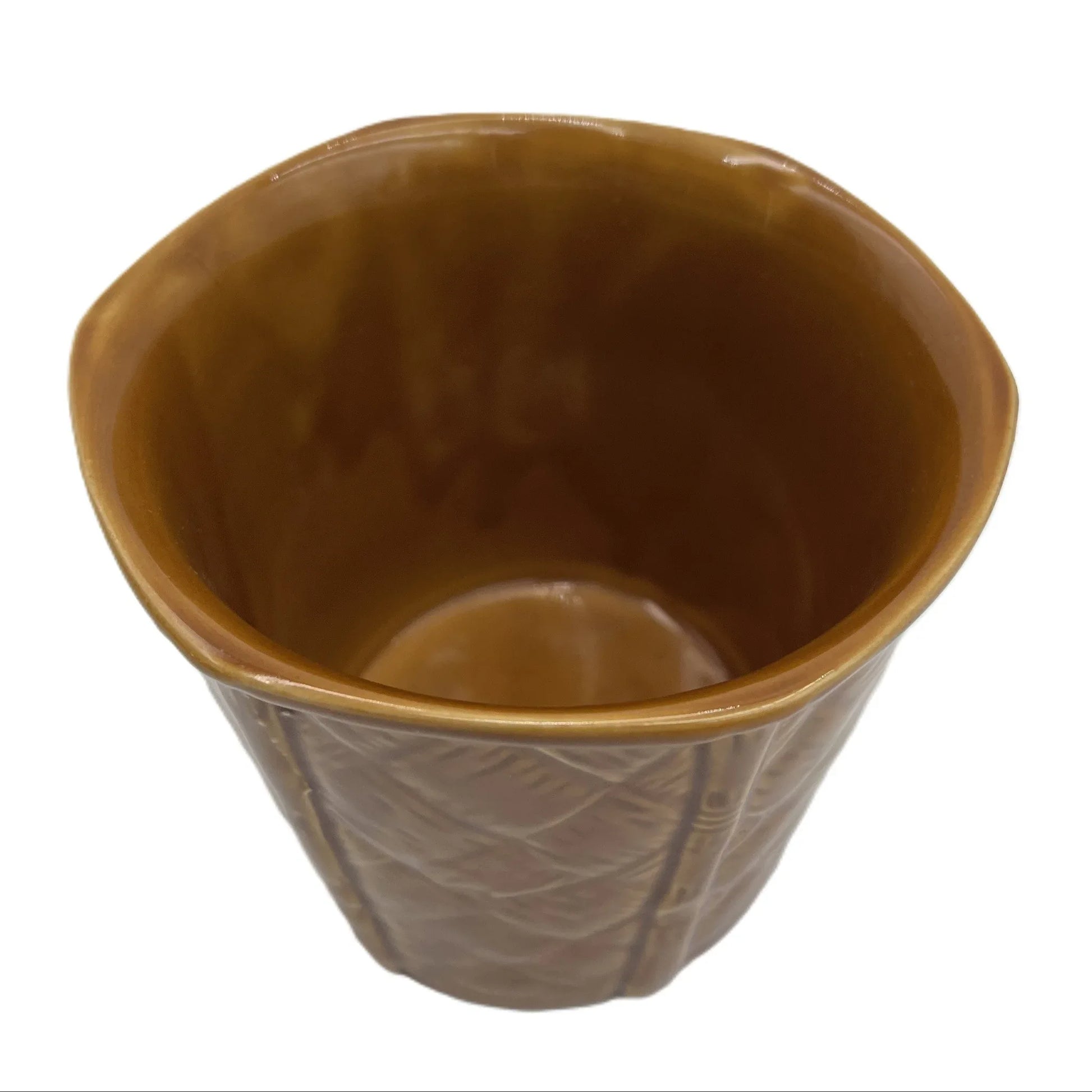 This is a vintage rich mustard rounded hexagonal shaped ceramic planter made by Churchill England. Typically featuring a bamboo and basket-weave or woven texture design, these planters were manufactured in the mid-20th century, often cited as the 1950s to 1980s
